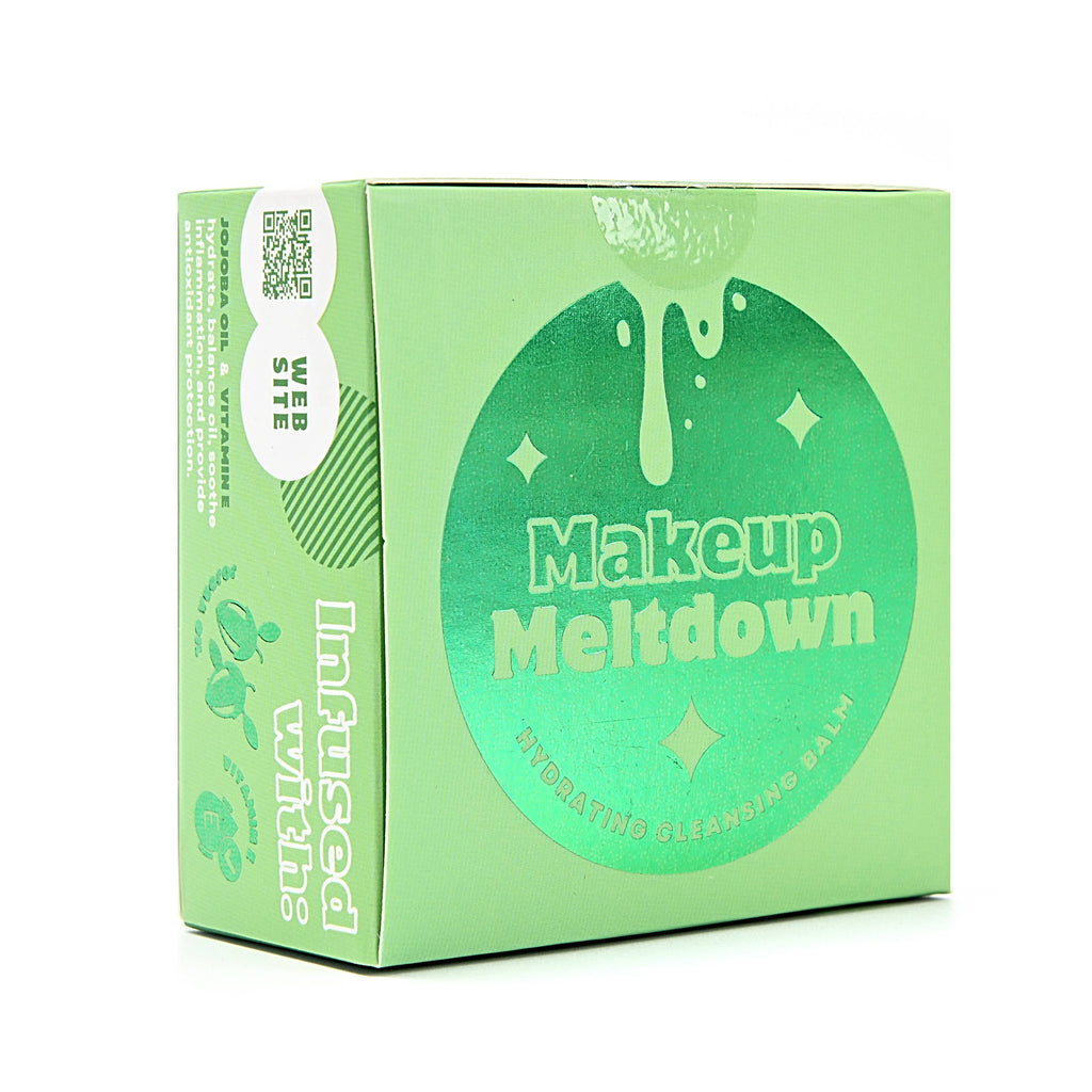 Green box of Makeup Meltdown cleansing balm on a white background