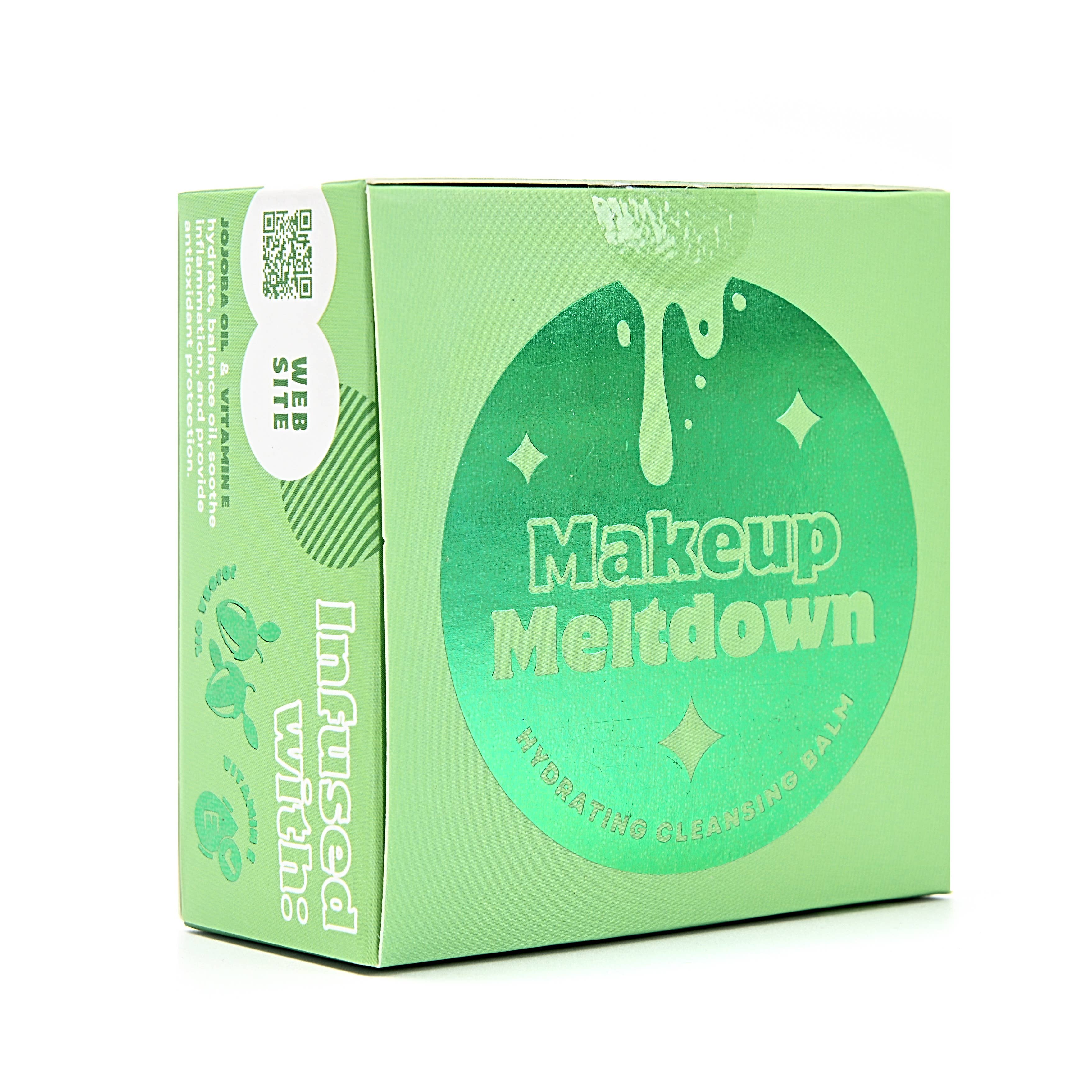Green box of Makeup Meltdown cleansing balm on a white background