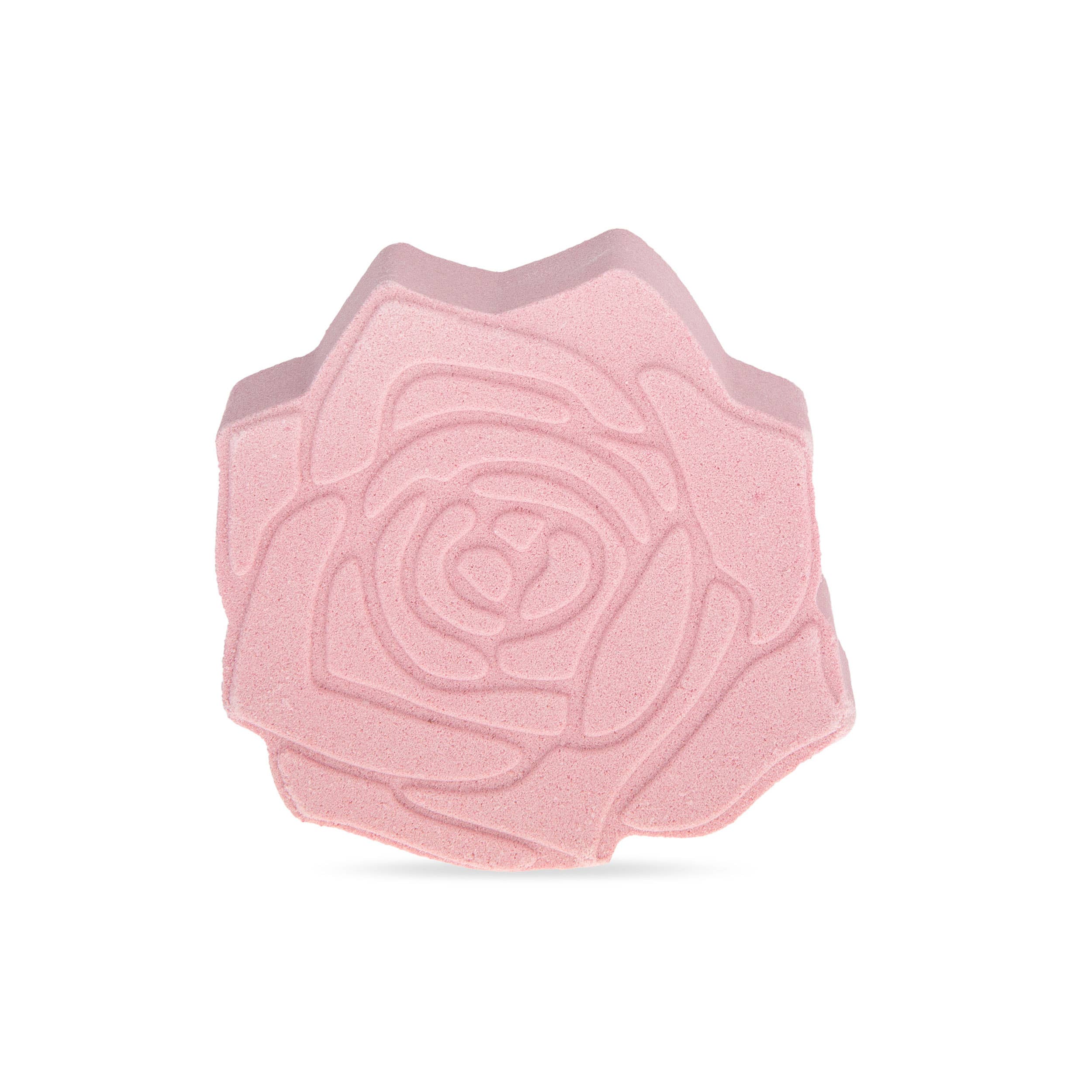 Rose shaped bath bomb against a white background
