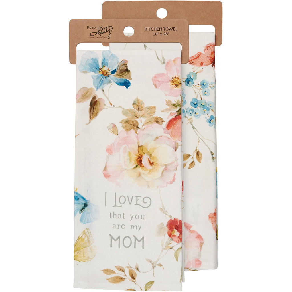 Floral kitchen towel with 'I love that you are my mom' text in packaging
