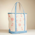 Tote bag with nautical patterns on a beige background