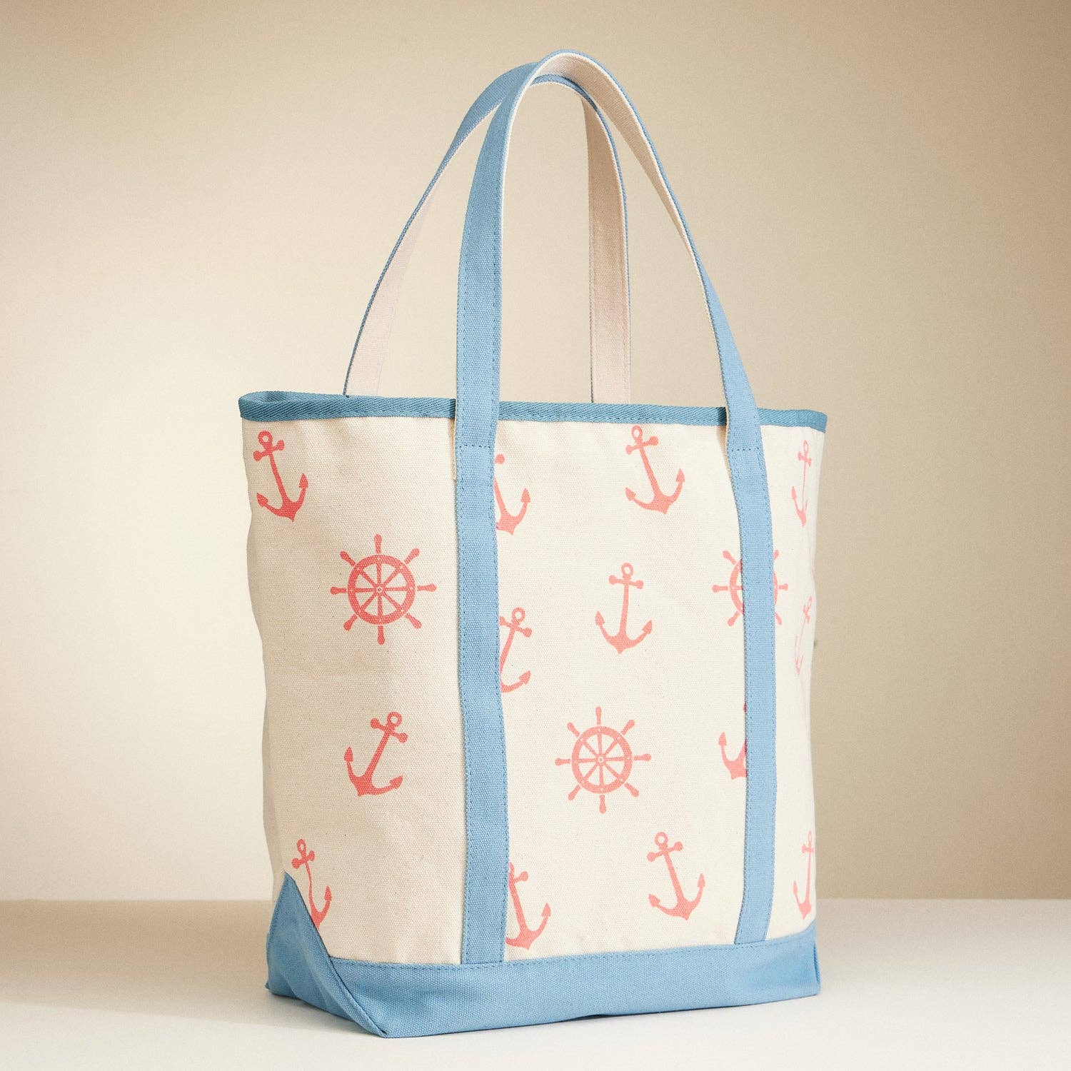 Tote bag with nautical patterns on a beige background