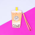 Brown bubble tea wristlet on a colorful background