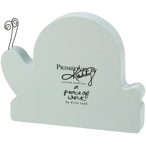 Light blue decorative item with 'Primitives by Kathy' branding on a white background