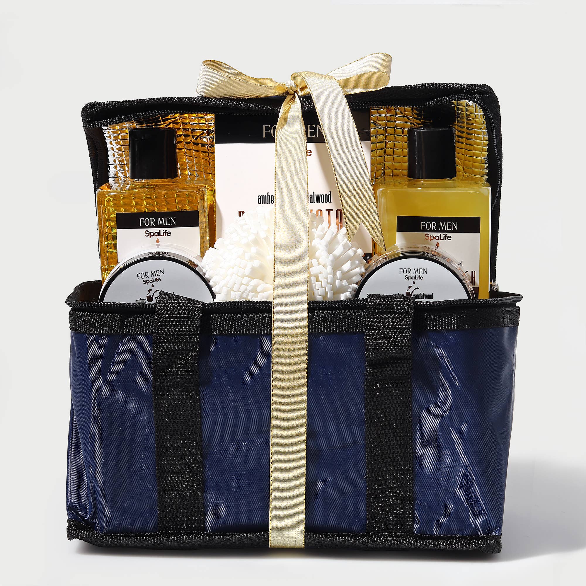 Men's grooming kit with bottles in a navy bag on a white background