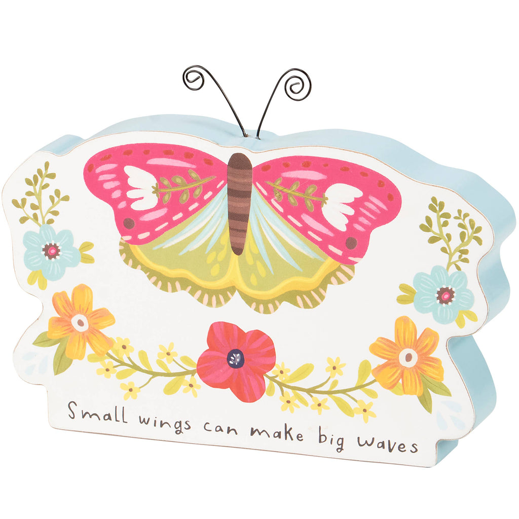 Butterfly-shaped decor with floral design and motivational quote on a white background