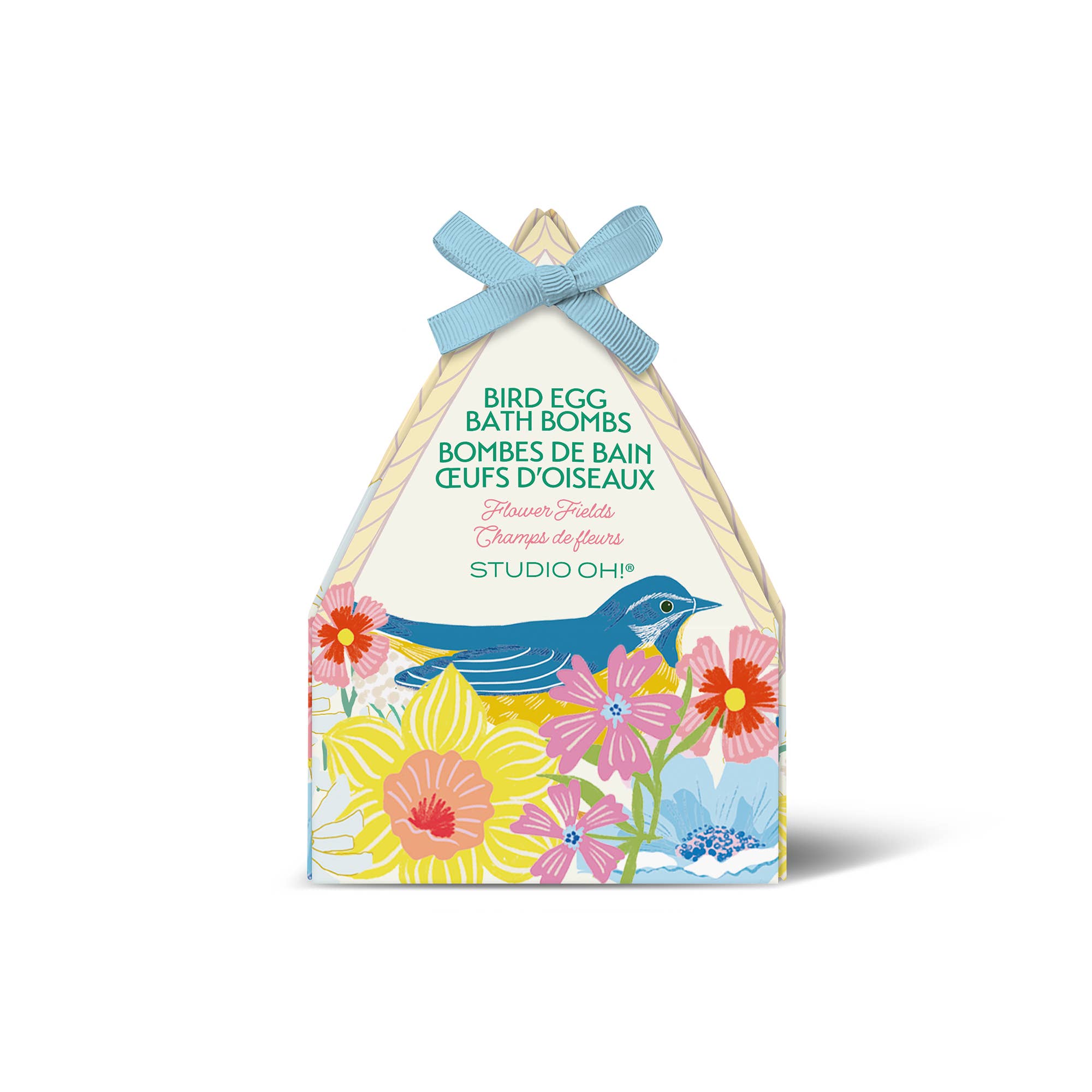 Packaging of Studio Oh! bird egg bath bombs with floral design and blue ribbon on a white background