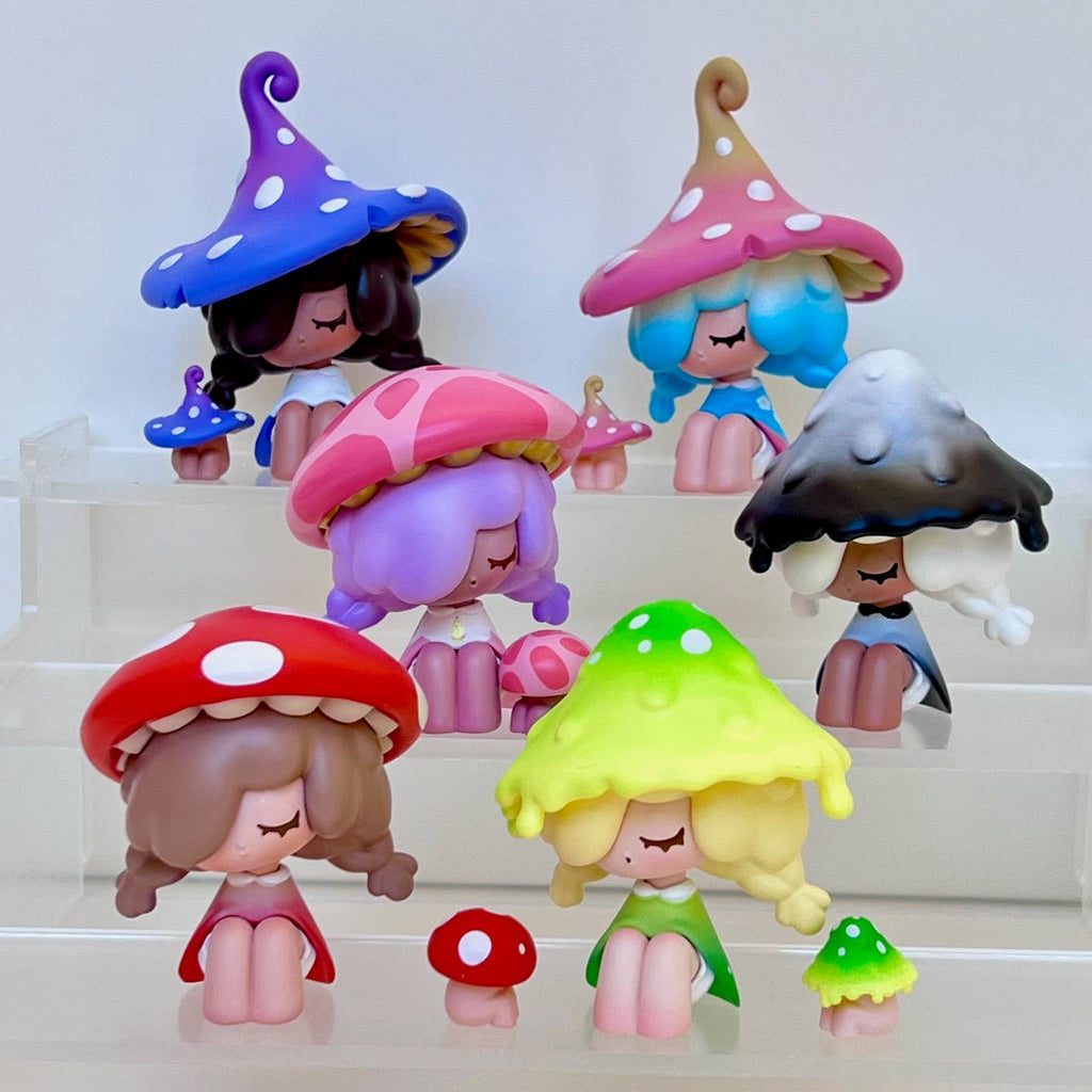 Colorful mushroom-shaped figurines with different hairstyles and outfits on a white background