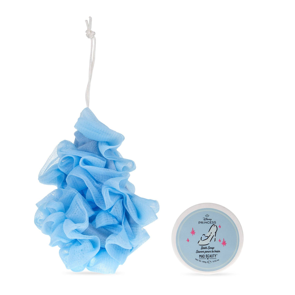 Blue bath pouf with a small container on a white background