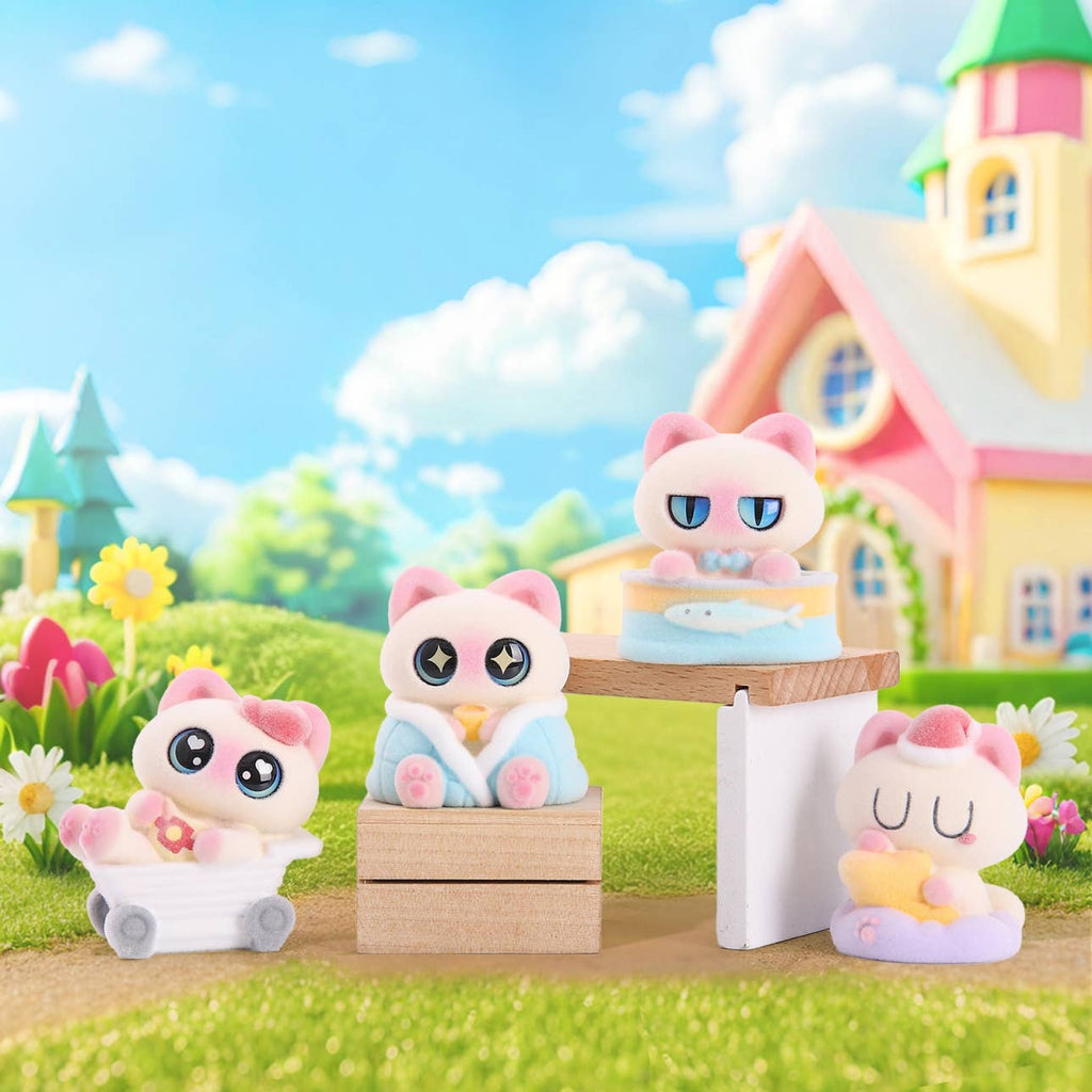Toy figures of pink and white animal-like characters in a colorful outdoor setting with a house and flowers.