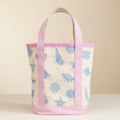 Tote bag with blue sea-themed pattern on a beige background