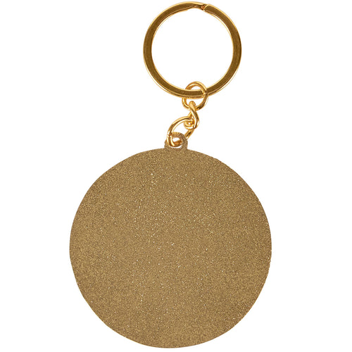 Gold keychain with a round metallic tag on a white background