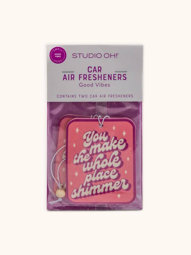 Studio Oh! car air fresheners packaging with pink design and text on a white background