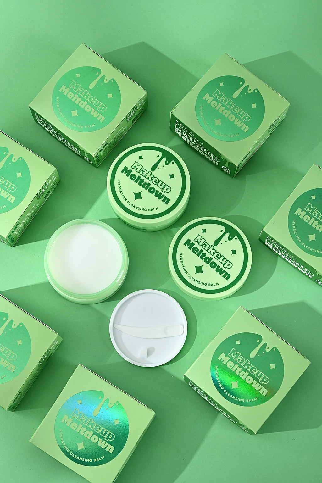 Green skincare product packaging with 'Makeup Meltdown' text on a green background